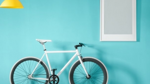 white-bike-in-blue-interior-PMNFYVU-607x455